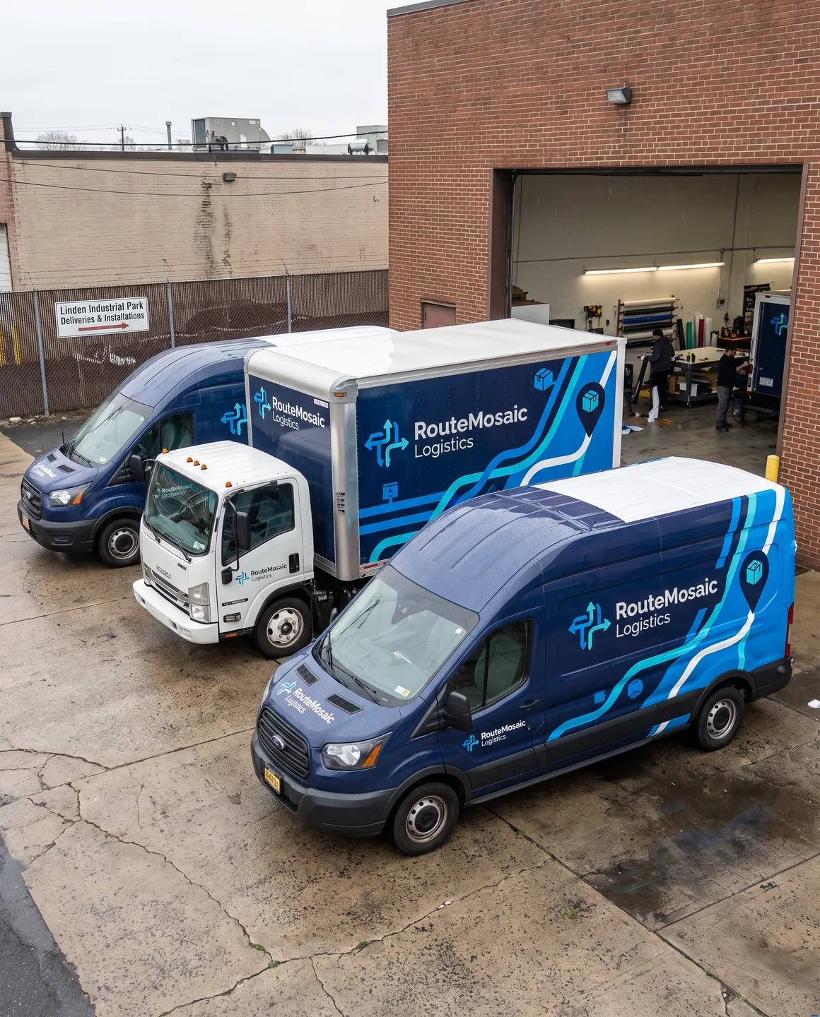 fleet of matching vehicles — side by side in facility or on road